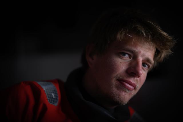 French skipper Leonard Legrand poses onboard his Ocean Fifty multihull Sodebo at the village of the Route du Rhum - Destination Guadeloupe, in Saint-Malo, western France on October 20, 2026, a few days prior to the start of the 13th edition of the Route du Rhum – Destination Guadeloupe solo sailing race from Saint-Malo to Pointe-a-Pitre in the French overseas island of Guadeloupe. (Photo by Loic VENANCE / AFP)