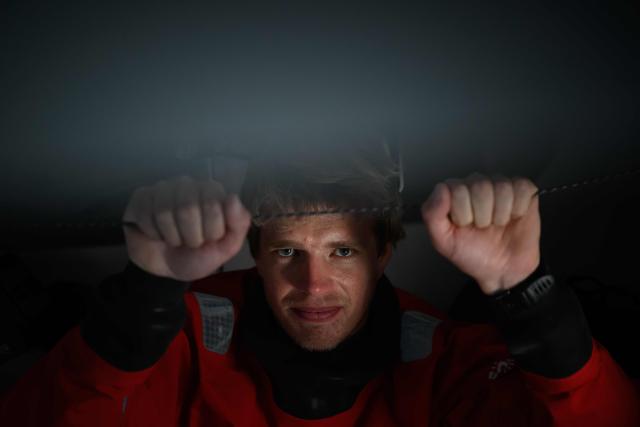 French skipper Leonard Legrand poses onboard his Ocean Fifty multihull Sodebo at the village of the Route du Rhum - Destination Guadeloupe, in Saint-Malo, western France on October 20, 2026, a few days prior to the start of the 13th edition of the Route du Rhum – Destination Guadeloupe solo sailing race from Saint-Malo to Pointe-a-Pitre in the French overseas island of Guadeloupe. (Photo by Loic VENANCE / AFP)