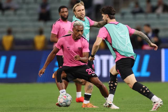 Sabah FK's Rwandan forward #20 Joy-Lance Mickels warms up prior to the UEFA Champions League football match between Sabah and Borussia Dortmund at the Baku Olympic Stadium in Baku on October 20, 2026. (Photo by Giorgi ARJEVANIDZE / AFP)