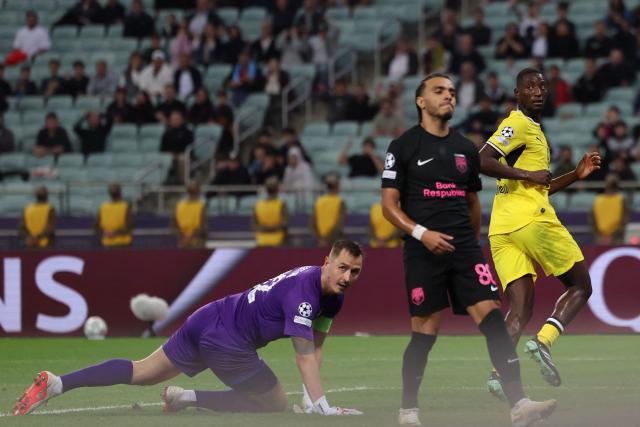 Dortmund's Guinean forward #09 Serhou Guirassy scores the opening goal during the UEFA Champions League football match between Sabah and Borussia Dortmund at the Baku Olympic Stadium in Baku on October 20, 2026. (Photo by Giorgi ARJEVANIDZE / AFP)