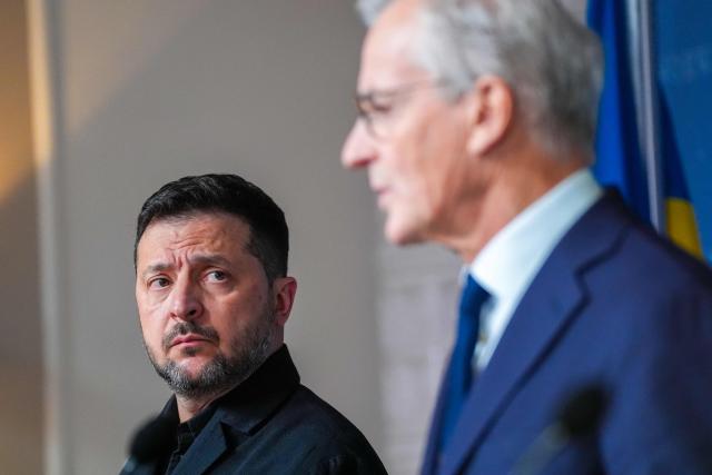 Ukraine's President Volodymyr Zelensky and Norway's Prime Minister Jonas Gahr Store deliver a joint press conference after a meeting on the situation in Ukraine on October 20, 2026 in Oslo. (Photo by Lise Åserud / NTB / AFP) / Norway OUT