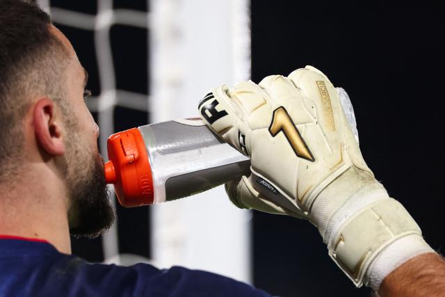 This photograph shows one of the gloves of Barcelona's Spanish goalkeeper #01 Joan Garcia ahead of the UEFA Champions League first round day 3 football match between Paris Saint-Germain (PSG) and FC Barcelona at the Parc de Princes stadium in Paris on October 20, 2026. (Photo by FRANCK FIFE / AFP)