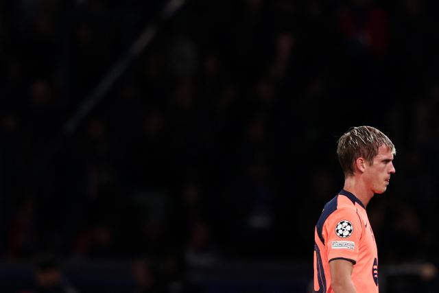 Barcelona's Spanish midfielder #20 Daniel Olmo leaves the pitch after sustaining an injury during the UEFA Champions League first round day 3 football match between Paris Saint Germain (PSG) and FC Barcelona at the Parc de Princes stadium in Paris on October 20, 2026. (Photo by FRANCK FIFE / AFP)
