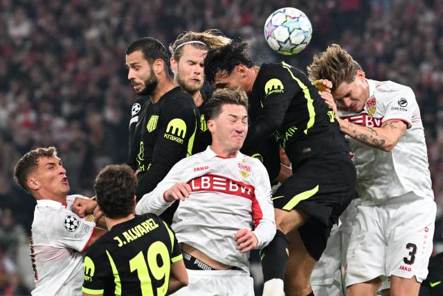 Players vie for the ball during the UEFA Champions League football match VfB Stuttgart v Atletico Madrid in Stuttgart, southern Germany, on October 20, 2026. (Photo by THOMAS KIENZLE / AFP)