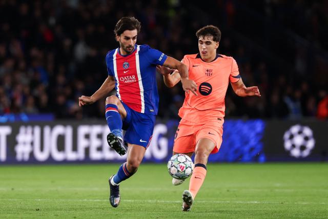 PSG's Spanish forward #09 Ferran Torres fights for the ball with Barcelona's Spanish defender #05 Pau Cubarsi during the UEFA Champions League first round day 3 football match between Paris Saint Germain (PSG) and FC Barcelona at the Parc de Princes stadium in Paris on October 20, 2026. (Photo by FRANCK FIFE / AFP)