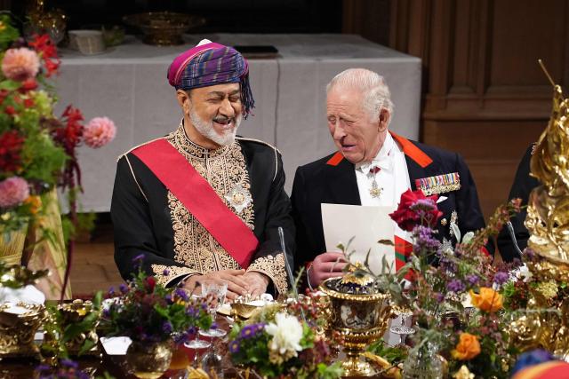 Oman's Sultan Haitham bin Tarik (L) shares a light moment with Britain's King Charles III during the State Banquet at Windsor Castle, Windsor, on October 20, 2026, the first day of a three-day State Visit to the United Kingdom by The Sultan of Oman. (Photo by Jordan Pettitt / POOL / AFP)