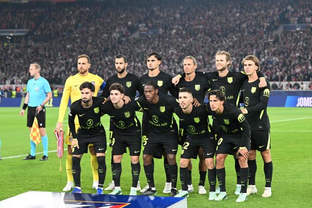 Atletico's players pose prior to the UEFA Champions League football match VfB Stuttgart v Atletico Madrid in Stuttgart, southern Germany, on October 20, 2026. (Photo by THOMAS KIENZLE / AFP)