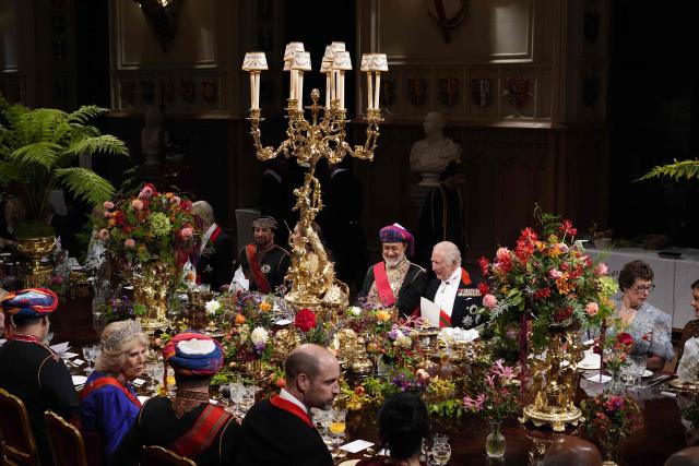 Oman's Sultan Haitham bin Tarik (L) shares a light moment with Britain's King Charles III during the State Banquet at Windsor Castle, Windsor, on October 20, 2026, the first day of a three-day State Visit to the United Kingdom by The Sultan of Oman. (Photo by Jordan Pettitt / POOL / AFP)