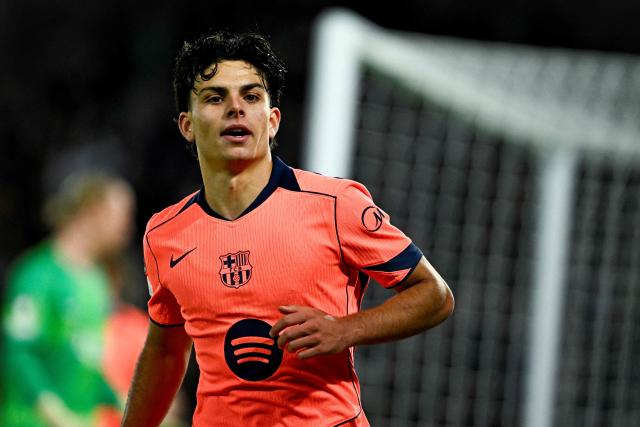 Barcelona's Spanish defender #12 Xavi Espart celebrates after scoring his team's first goal during the UEFA Champions League first round day 3 football match between Paris Saint-Germain (PSG) and FC Barcelona at the Parc de Princes stadium in Paris on October 20, 2026. (Photo by JULIEN DE ROSA / AFP)