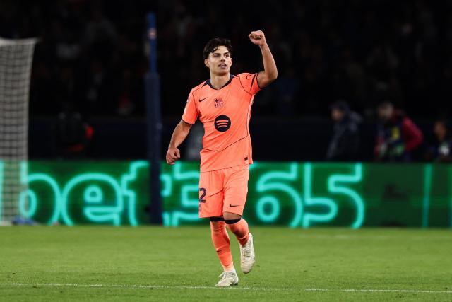 Barcelona's Spanish defender #12 Xavi Espart celebrates after scoring his team first goal during the UEFA Champions League first round day 3 football match between Paris Saint Germain (PSG) and FC Barcelona at the Parc de Princes stadium in Paris on October 20, 2026. (Photo by FRANCK FIFE / AFP)
