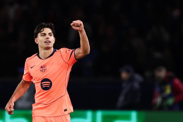 Barcelona's Spanish defender #12 Xavi Espart celebrates after scoring his team first goal during the UEFA Champions League first round day 3 football match between Paris Saint Germain (PSG) and FC Barcelona at the Parc de Princes stadium in Paris on October 20, 2026. (Photo by FRANCK FIFE / AFP)