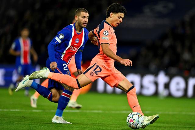 Barcelona's Spanish defender #12 Xavi Espart shoots to score his team's first goal during the UEFA Champions League first round day 3 football match between Paris Saint-Germain (PSG) and FC Barcelona at the Parc de Princes stadium in Paris on October 20, 2026. (Photo by JULIEN DE ROSA / AFP)
