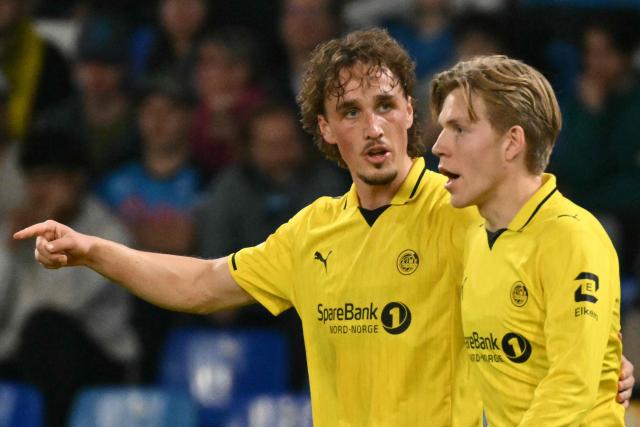 Bodo/Glimt's Norwegian forward #09 Andreas Helmersen celebrates scoring his team's second goal with Bodo/Glimt's Norwegian forward #10 Jens Petter Hauge during the UEFA Champions League - first round day 3 football match between Napoli and Bodo Glimt at the Diego Armando Maradona stadium in Naples on October 20, 2026. (Photo by Alberto PIZZOLI / AFP)