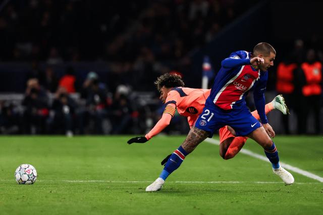 Barcelona's Spanish forward #10 Lamine Yamal fights for the ball with PSG's French defender #21 Lucas Hernandez (R) during the UEFA Champions League first round day 3 football match between Paris Saint-Germain (PSG) and FC Barcelona at the Parc de Princes stadium in Paris on October 20, 2026. (Photo by FRANCK FIFE / AFP)