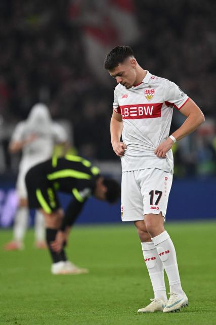 Stuttgart's German forward #17 Dzenan Pejcinovic reacts after the UEFA Champions League football match VfB Stuttgart v Atletico Madrid in Stuttgart, southern Germany, on October 20, 2026. (Photo by THOMAS KIENZLE / AFP)
