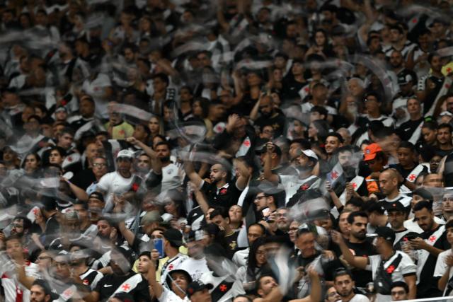 Vasco da Gama supporters cheer for their team ahead of the Copa Sudamericana semifinal second leg football match between Brazil's Vasco da Gama and Argentina's Boca Juniors at the Maracana stadium in Rio de Janeiro, Brazil, on October 20, 2026. (Photo by MAURO PIMENTEL / AFP)