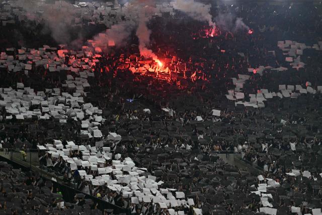 Vasco da Gama supporters cheer before the Copa Sudamericana semifinal second leg football match between Brazil's Vasco da Gama and Argentina's Boca Juniors at the Maracana stadium in Rio de Janeiro, Brazil, on October 20, 2026. (Photo by Pablo PORCIUNCULA / AFP)