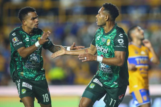 Leon's Panamanian forward #11 Ismael Diaz (R) celebrates scoring his team's first goal during the Liga MX Apertura tournament football match between Tigres and Leon at the Universitario de la UANL stadium in Monterrey, Nuevo Leon state, Mexico, on October 20, 2026. (Photo by Julio Cesar AGUILAR / AFP)