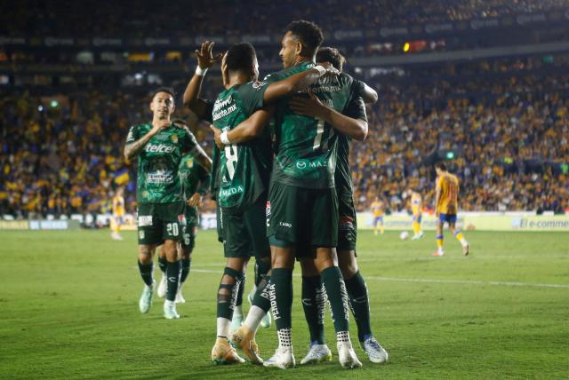 Leon's Panamanian forward #11 Ismael Diaz (R) celebrates scoring his team's first goal during the Liga MX Apertura tournament football match between Tigres and Leon at the Universitario de la UANL stadium in Monterrey, Nuevo Leon state, Mexico, on October 20, 2026. (Photo by Julio Cesar AGUILAR / AFP)