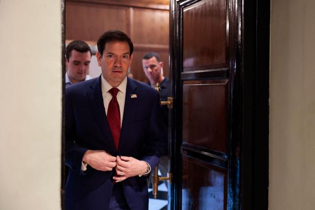US Secretary of State Marco Rubio arrives to speak with members of the media at the Taj Mahal Palace hotel in Mumbai on October 21, 2026. (Photo by KYLIE COOPER / POOL / AFP)