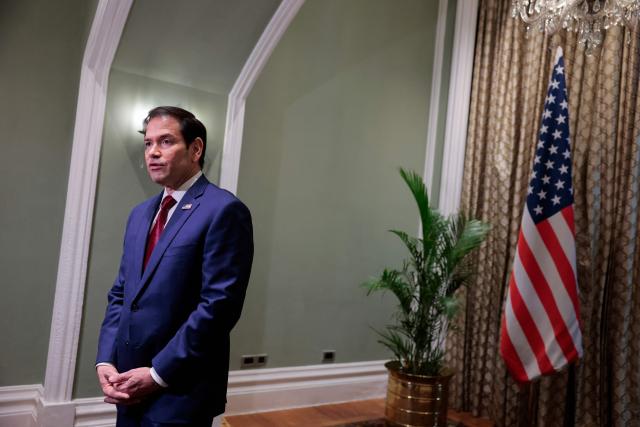 US Secretary of State Marco Rubio speaks with members of the media at the Taj Mahal Palace hotel in Mumbai on October 21, 2026. (Photo by KYLIE COOPER / POOL / AFP)