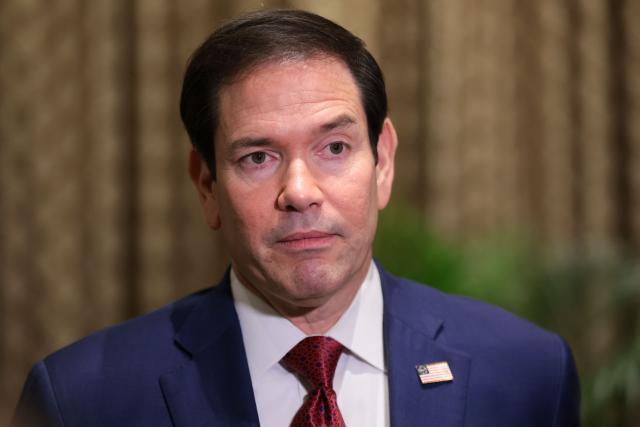 US Secretary of State Marco Rubio speaks with members of the media at the Taj Mahal Palace hotel in Mumbai on October 21, 2026. (Photo by KYLIE COOPER / POOL / AFP)