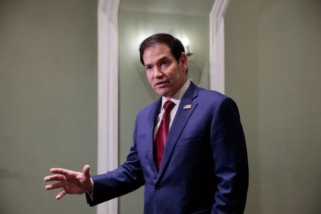 US Secretary of State Marco Rubio speaks with members of the media at the Taj Mahal Palace hotel in Mumbai on October 21, 2026. (Photo by KYLIE COOPER / POOL / AFP)