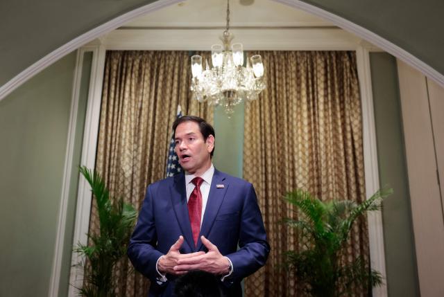 US Secretary of State Marco Rubio speaks with members of the media at the Taj Mahal Palace hotel in Mumbai on October 21, 2026. (Photo by KYLIE COOPER / POOL / AFP)