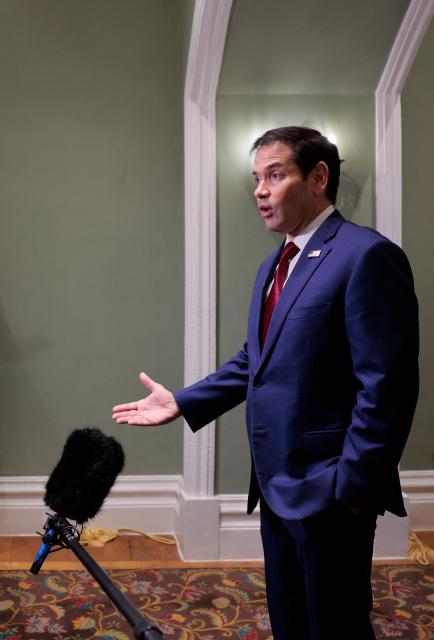 US Secretary of State Marco Rubio speaks with members of the media at the Taj Mahal Palace hotel in Mumbai on October 21, 2026. (Photo by KYLIE COOPER / POOL / AFP)