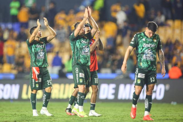 Leon's players celebrate after winning the Liga MX Apertura tournament football match between Tigres and Leon at the Universitario de la UANL stadium in Monterrey, Nuevo Leon state, Mexico, on October 20, 2026. (Photo by Julio Cesar AGUILAR / AFP)