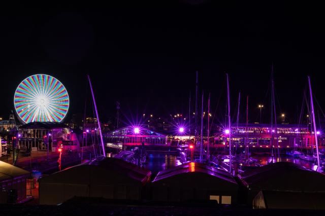 This photograph shows the harbour of Saint-Malo at night, western France on October 20, 2026, a few days before the start of the 13th Route du Rhum Destination Guadeloupe. From Saint-Malo in Brittany to Pointe-a-Pitre in Guadeloupe, over 100 skippers across 6 classes will take the start on November 1, 2026, in this solo transatlantic sailing race. (Photo by Martin BUREAU / AFP)
