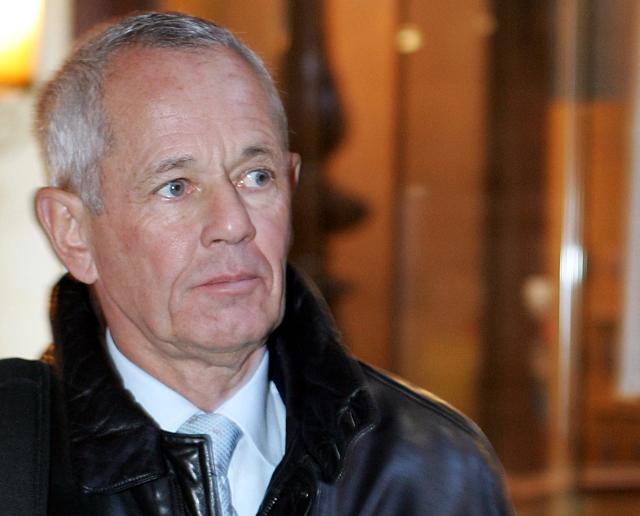 (FILES) This file photograph taken on December 14, 2004 shows former French gendarme captain Paul Barril, a defendant in an presidential eavesdropping case, arriving at a courthouse in Paris. National Gendarmerie Intervention Group (GIGN) co-founder Paul Barril died aged 80, the GIGN announced on October 21, 2026. (Photo by Jack GUEZ / AFP)