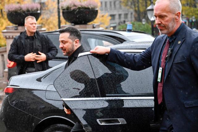 Ukraine's President Volodymyr Zelensky gets out of his car as he arrives at Norway's parliament in Oslo on October 21, 2026, one day after a meeting in the Norwegian capital on the situation in Ukraine. Ukrainian President Volodymyr Zelensky arrived in Oslo on October 20, 2026 for talks with top US envoys. (Photo by Jonathan Nackstrand / AFP)