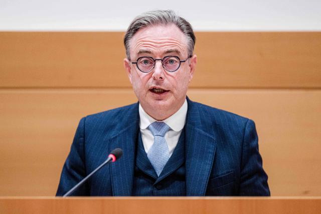 Belgium's Prime Minister Bart De Wever delivers a speech at a session of the Chamber Commission for Interior, Security, Migration and Administrative Affairs at the federal parliament in Brussels on October 21, 2026. (Photo by EMILE WINDAL / Belga / AFP) / Belgium OUT
