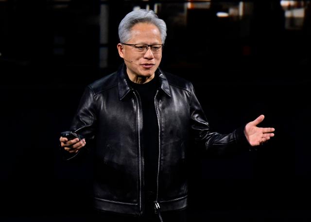 Co-founder, President and CEO of US technology company Nvidia, Jensen Huang speaks during the Nvidia GTC Berlin 2026 Artificial Intelligence conference, on October 21, 2026 in Berlin. (Photo by John MACDOUGALL / AFP)