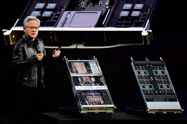 Co-founder, President and CEO of US technology company Nvidia, Jensen Huang delivers his keynote speech during the Nvidia GTC Berlin 2026 Artificial Intelligence conference, on October 21, 2026 in Berlin. (Photo by John MACDOUGALL / AFP)