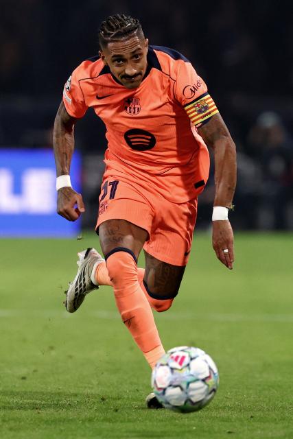 Barcelona's Brazilian #11 forward Raphinha eyes the ball during the UEFA Champions League first round day 3 football match between Paris Saint Germain (PSG) and FC Barcelona at the Parc de Princes stadium in Paris on October 20, 2026. (Photo by FRANCK FIFE / AFP)