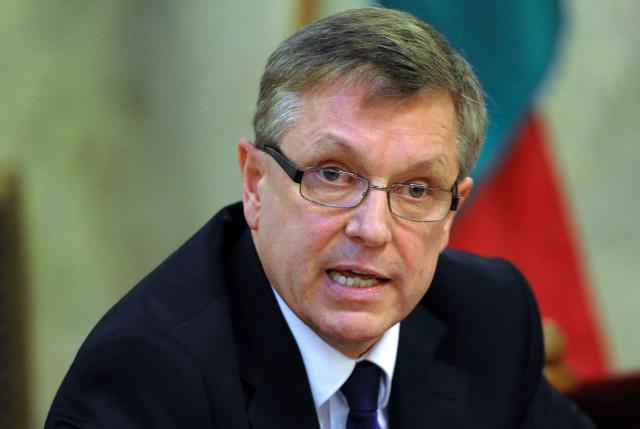 (ALTERNATIVE CROP) Picture taken on March 1, 2013 shows then economy minister of Hungary's Orban's government Gyorgy Matolcsy talking to the members of the Economy committee of the Hungarian Parliament at the Delegation Hall of the parliament building in Budapest, during his official hearing. Hungary's former central bank governor -- once a close ally of ex-leader Viktor Orban -- was detained on October 21, 2026, his lawyer told local media, in one of the country's most high-profile graft cases. Gyorgy Matolcsy, 71, who headed the Hungarian National Bank (MNB) between 2013 and 2025, was taken into custody in connection with a sprawling scandal surrounding his tenure, his lawyer Pal Batki told news site Telex. (Photo by Attila KISBENEDEK / AFP) / ALTERNATE CROP