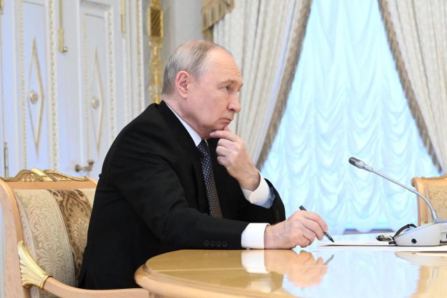 In this pool photograph distributed by the Russian state agency Sputnik, Russia's President Vladimir Putin attends a meeting with US special envoy in Saint Petersburg on October 21, 2026. (Photo by Kristina Solovyova / POOL / AFP) / Editor's note: This image is distributed by the Russian state owned agency Sputnik