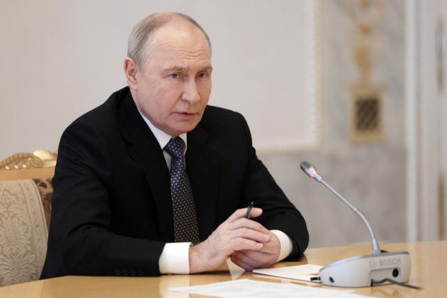 In this pool photograph distributed by the Russian state agency Sputnik, Russia's President Vladimir Putin attends a meeting with US special envoy in Saint Petersburg on October 21, 2026. (Photo by Gavriil GRIGOROV / POOL / AFP) / Editor's note: This image is distributed by the Russian state owned agency Sputnik