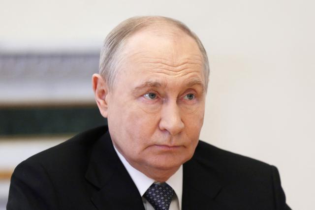 In this pool photograph distributed by the Russian state agency Sputnik, Russia's President Vladimir Putin attends a meeting with US special envoy in Saint Petersburg on October 21, 2026. (Photo by Gavriil GRIGOROV / POOL / AFP) / Editor's note: This image is distributed by the Russian state owned agency Sputnik