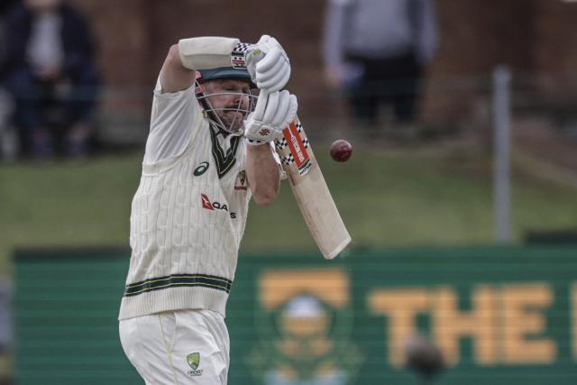 Australia's Travis Head plays a shot on day four of the second Test match between South Africa and Australia at St Georges Park in Gqeberha on October 21, 2026. Australia were made to follow on after being dismissed for just 99 in reply to South Africa's first innings total of 425 for nine declared, a deficit of 326 runs, on day four at Gqeberha. (Photo by Marco Longari / AFP) / ALTERNATE CROP