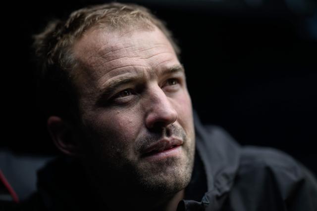 British skipper Sam Goodchild poses for a photo session aboard his Imoca monohull Macif at the village of the Route du Rhum - Destination Guadeloupe, a few days prior to the start of this solo sailing race from Saint-Malo, western France to Pointe-a-Pitre in the French overseas island of Guadeloupe, in Saint-Malo, western France, on October 21, 2026. (Photo by Loic VENANCE / AFP)