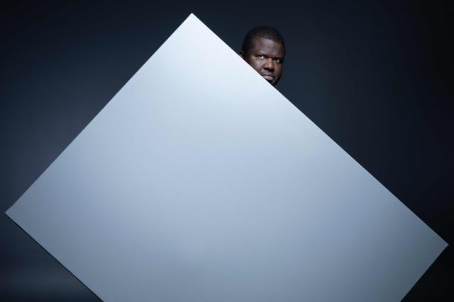 (FILES) Haitian-born Quebecois writer, poet, and novelist Thelyson Orelien, poses during a photo session in Paris on September 8, 2026. Canadian publisher Editions Boreal said on October 21, 2026 that novelist Orelien used AI to write novel, one week after announcing that is was keeping the novel in bookstores, asserting that it has no element making it possible to establish with certainty a recourse to artificial intelligence (AI) for its writing. (Photo by Joel Saget / AFP)