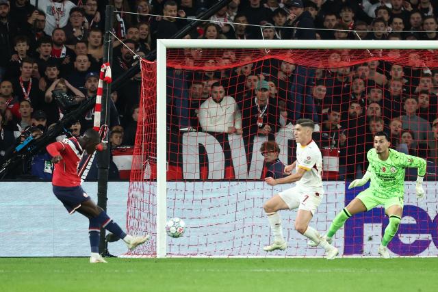 Lille's French forward #35 Soriba Diaoune (L) shoots to score his team's second goal during the UEFA Champions League first round day 3 football match between Lille LOSC and Galatasaray at the Pierre Mauroy Stadium in Villeneuve-d'Ascq, northern France on October 21, 2026. (Photo by Sameer AL-DOUMY / AFP)