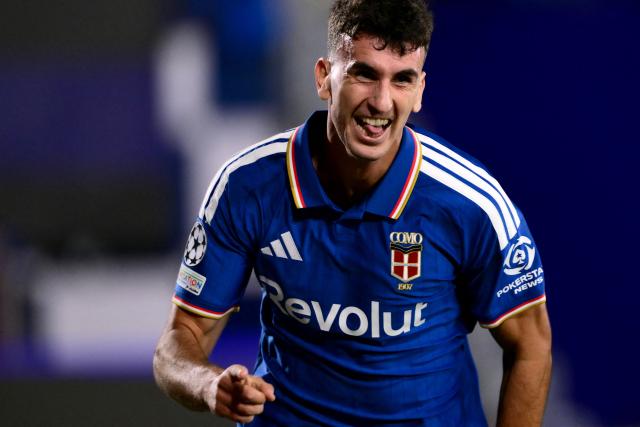 Como's Spanish defender #04 Jacobo Ramon celebrates scoring his team's fourth goal during the UEFA Champions League, league phase matchday 3, football match between Como 1907 and Manchester United at the Stadio Giuseppe Sinigaglia in Como, northen Italy on October 21, 2026. (Photo by Marco BERTORELLO / AFP)