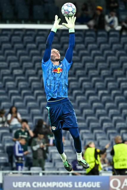 RB Leipzig's Belgian goalkeeper #26 Maarten Vandevoordt warms up before their UEFA Champions League first round day 3 football match between Real Madrid CF and RB Leipzig at the Santiago Bernabeu stadium in Madrid on October 21, 2026. (Photo by Javier SORIANO / AFP)