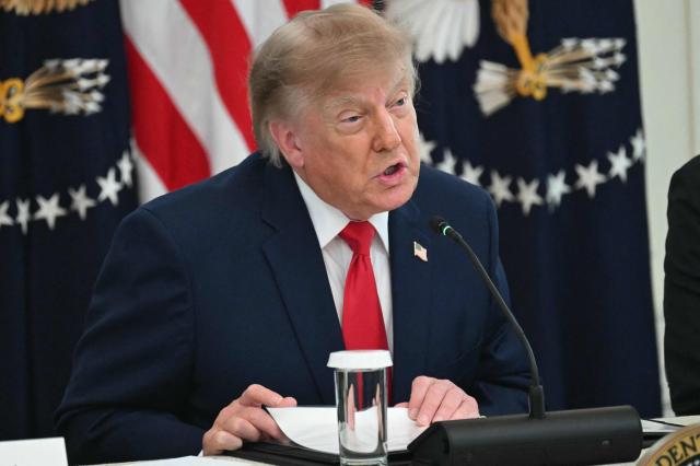 US President Donald Trump speaks during a roundtable in the East Room of the White House in Washington, DC on October 21, 2026. (Photo by SAUL LOEB / AFP)