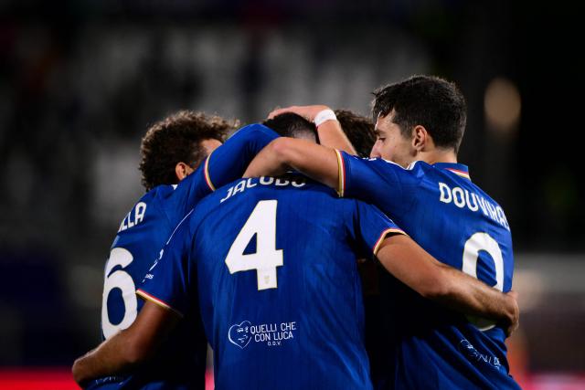 Como's Spanish defender #04 Jacobo Ramon (C) celebrates scoring his team's fourth goal with his teammates during the UEFA Champions League, league phase matchday 3, football match between Como 1907 and Manchester United at the Stadio Giuseppe Sinigaglia in Como, northen Italy on October 21, 2026. (Photo by Marco BERTORELLO / AFP)