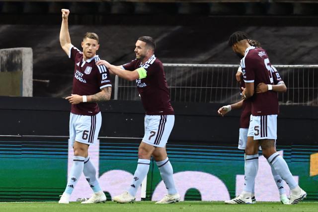 Aston Villa's English midfielder  #06 Ross Barkley (L) celebrates with teammates after scoring the opening goal during the UEFA Champions League, league phase football match between Aston Villa and Viking at Villa Park in Birmingham, central England on October 21, 2026. (Photo by Henry NICHOLLS / AFP)